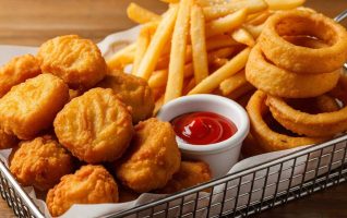 Chicken Nuggets Basket with Fries or Onion Rings