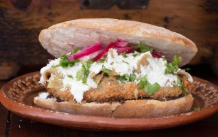 Chilaquiles Torta with Breaded Chicken Breast